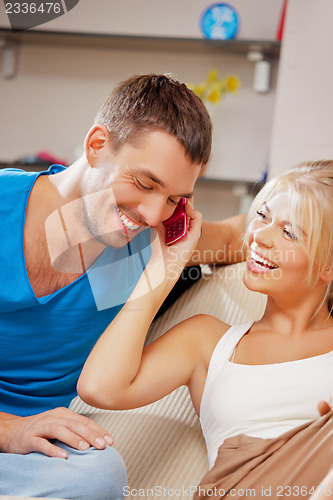 Image of happy couple at home