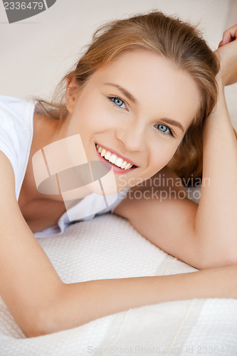 Image of happy and smiling teenage girl