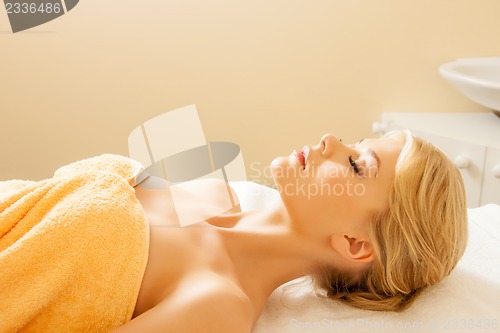 Image of beautiful woman in spa salon