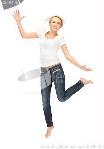 Image of jumping woman in blank white t-shirt