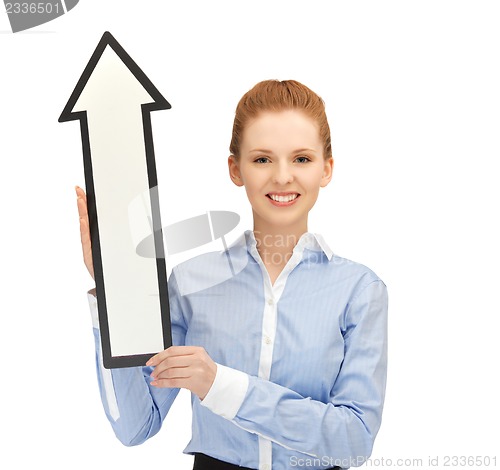 Image of woman with direction arrow sign