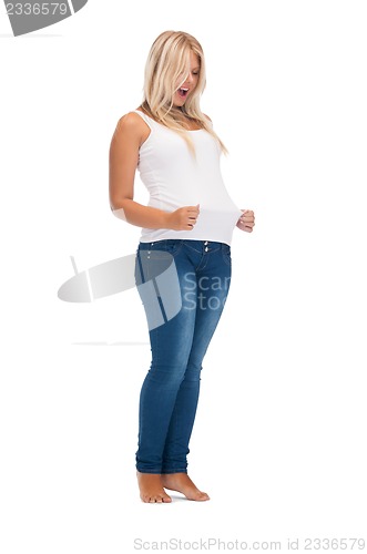 Image of smiling teenage girl in blank white t-shirt