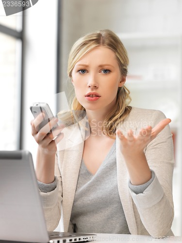 Image of businesswoman with cell phone