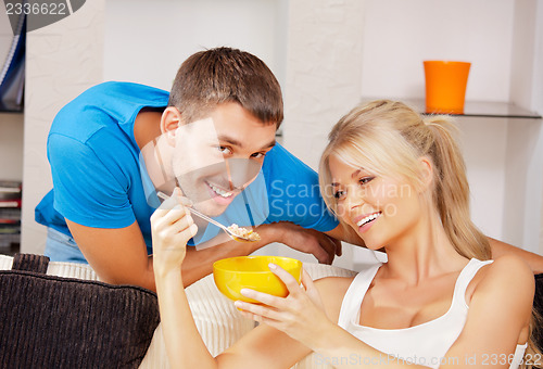 Image of happy couple at home