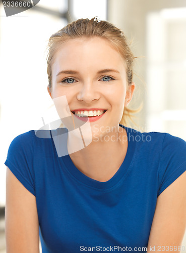 Image of happy and smiling teenage girl