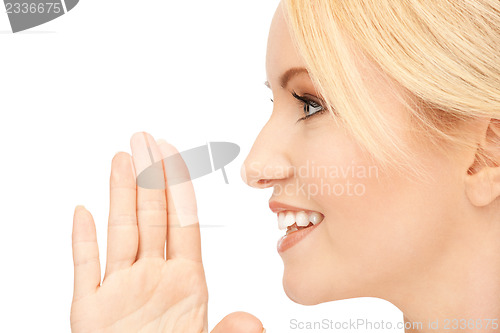 Image of woman whispering gossip