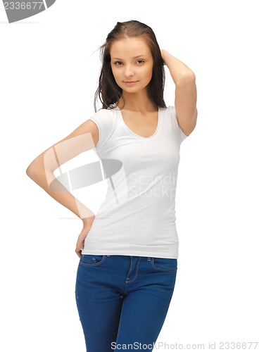 Image of smiling teenage girl in blank white t-shirt