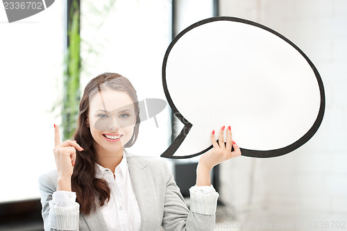 Image of smiling businesswoman with blank text bubble