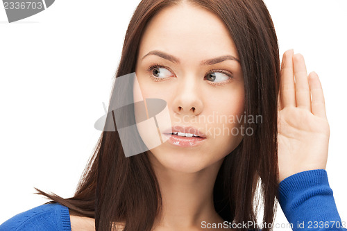 Image of serious woman listening gossip