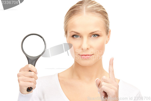 Image of woman with magnifying glass