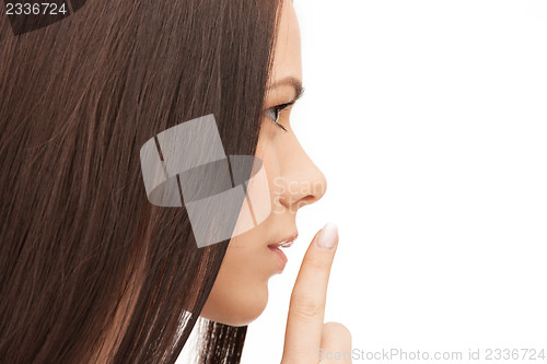 Image of picture of woman with finger on lips