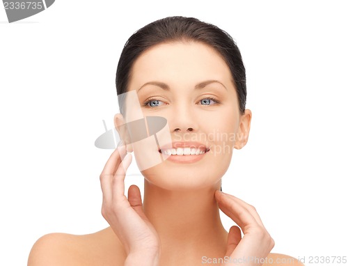 Image of face and hands of beautiful woman