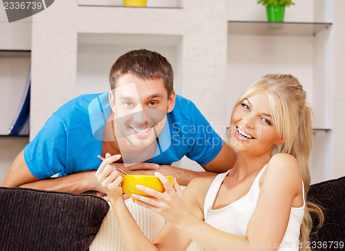 Image of happy couple at home