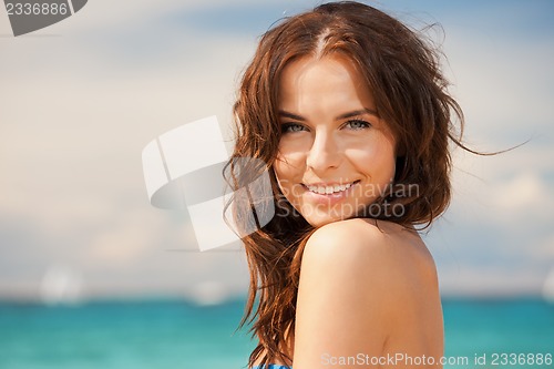Image of beautiful woman on a beach