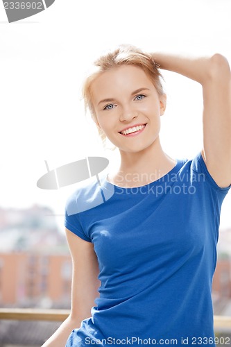 Image of happy and smiling teenage girl