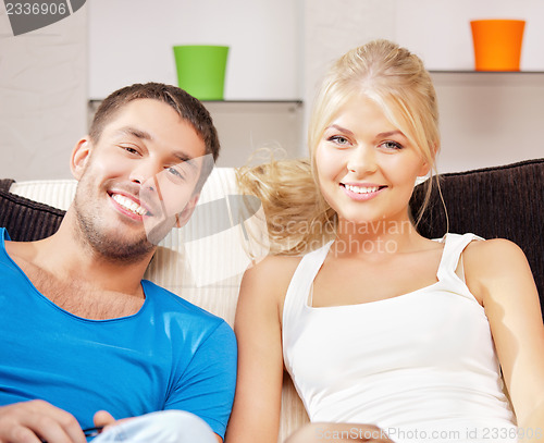 Image of happy couple at home