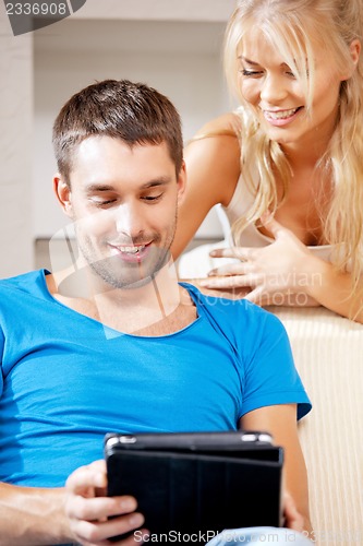 Image of happy couple at home