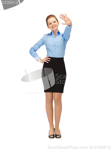 Image of stewardess making greeting gesture