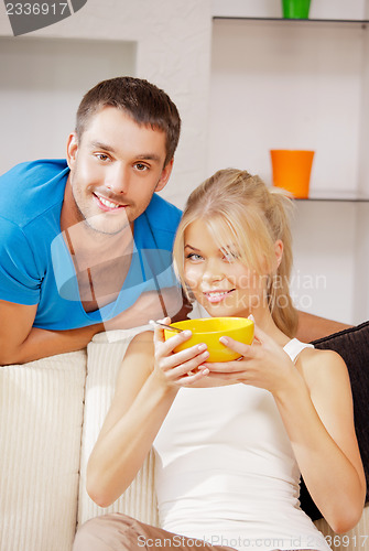 Image of happy couple at home
