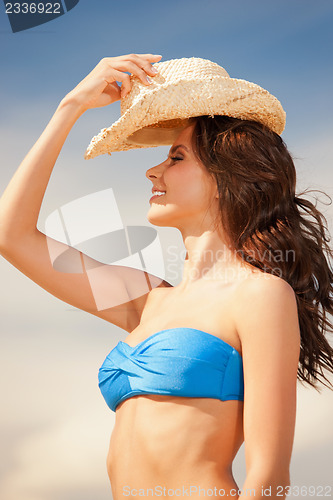 Image of happy smiling woman in hat