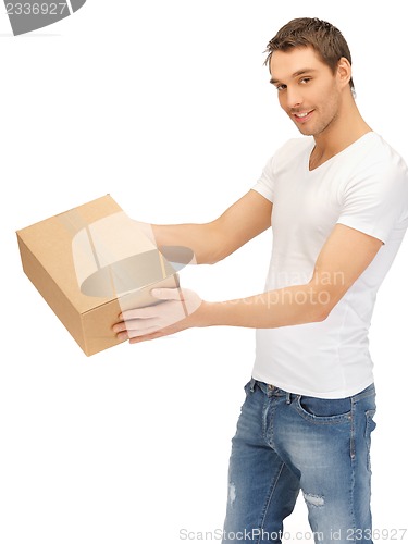 Image of handsome man with big box