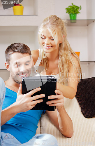 Image of happy couple at home