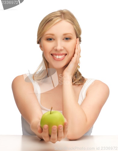 Image of woman with green apple