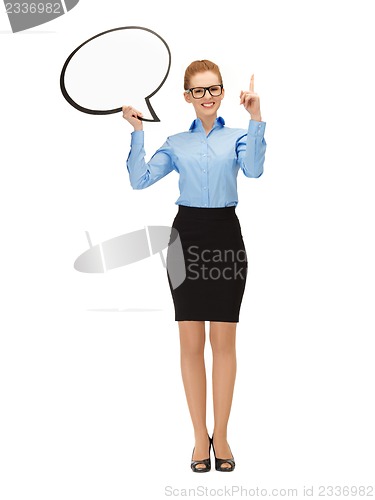 Image of smiling businesswoman with blank text bubble