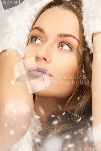 Image of beautiful woman in white gloves