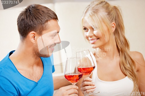 Image of romantic couple drinking wine