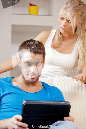 Image of couple with tablet PC