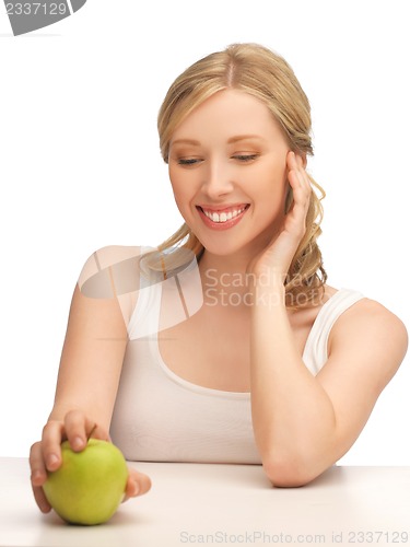 Image of woman with green apple