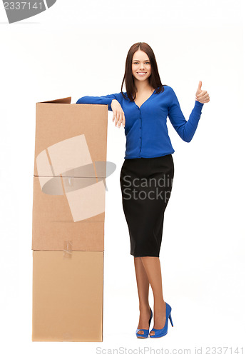 Image of businesswoman with big boxes