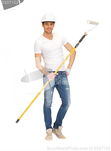 Image of handsome painter in helmet