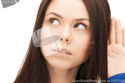 Image of serious woman listening gossip