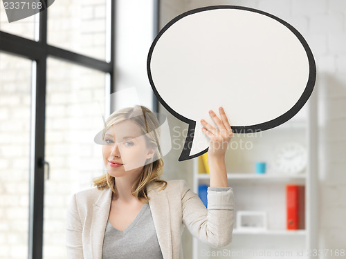 Image of smiling businesswoman with blank text bubble