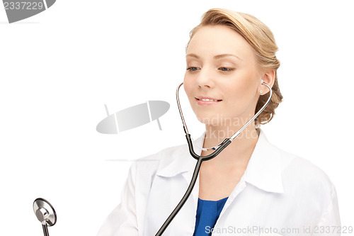 Image of attractive female doctor with stethoscope