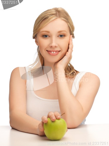 Image of woman with green apple