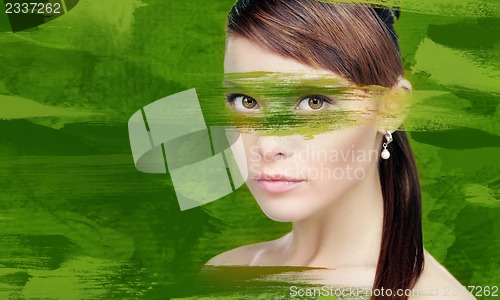 Image of woman with green paint