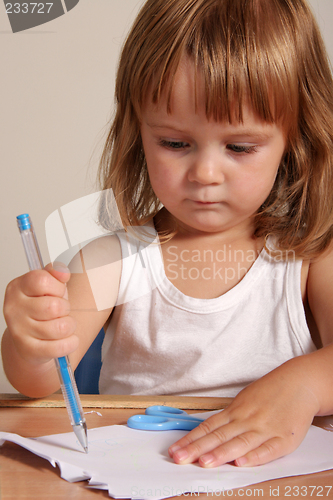 Image of child writing