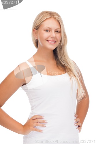 Image of smiling teenage girl in blank white t-shirt