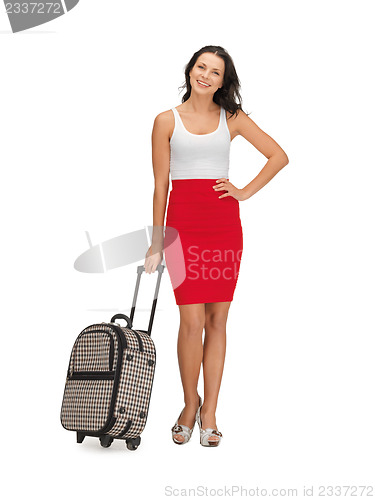 Image of lovely woman with suitcase
