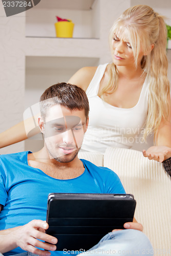 Image of couple with tablet PC