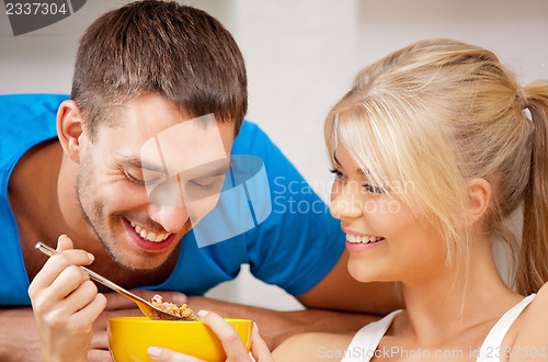 Image of happy couple at home
