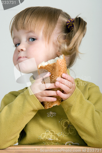 Image of child eating bread