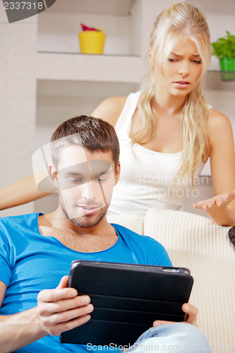 Image of couple with tablet PC