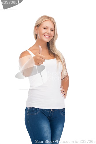 Image of teenage girl in blank white t-shirt with thumbs up