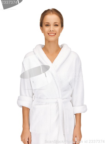 Image of beautiful woman in white bathrobe