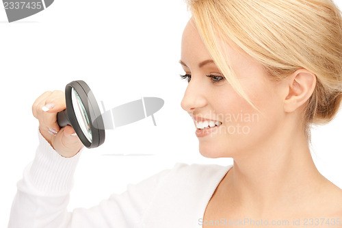 Image of woman with magnifying glass