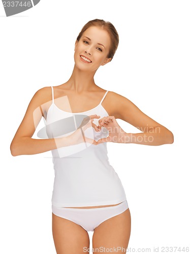 Image of woman in cotton undrewear forming heart shape